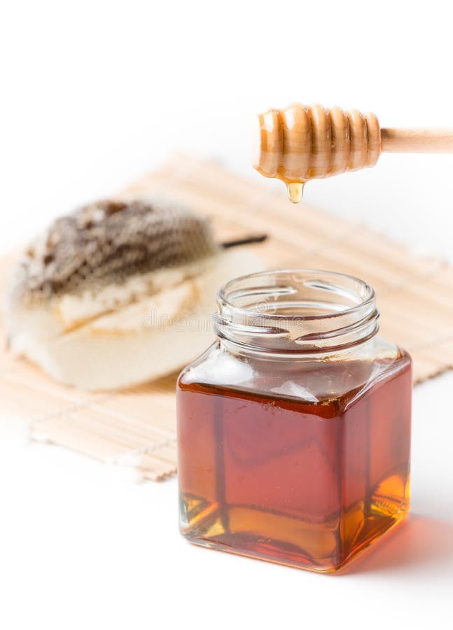 Honeycomb and honey isolated stock images Honeycomb and honey isolated stock images