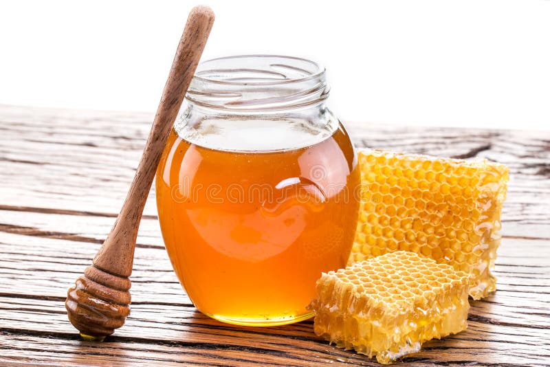 Qué Significa En Español Honey Honeycomb and Pot of Fresh Honey. High-quality Picture Contains Stock