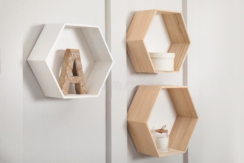 Shaped Shelves with Decorative Elements on White Wall Stock Image Image of material