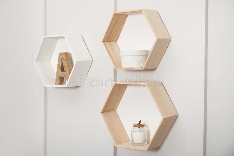 Shaped Shelves with Decorative Elements on White Wall Stock Image Image of