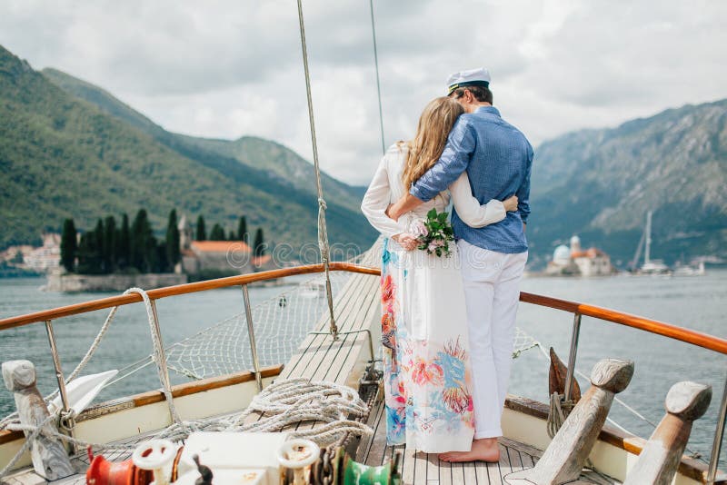 Honeymoon couple travel on yacht