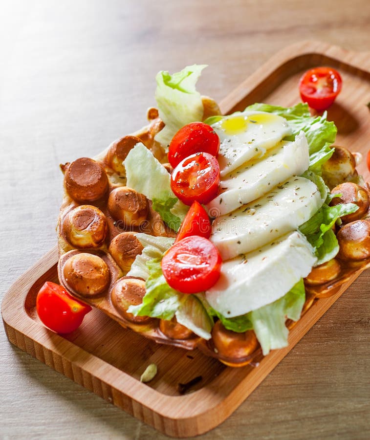 Hong Kong Bubble Waffles Sandwich with Mozzarella Cheese and Vegetables