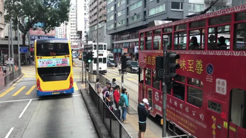 Hong kong china en dubbeldäckare som kör ner på gatan