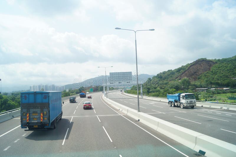 Hong-Kong, China: Tráfico por carretera imagen de archivo libre de regalías Hong-Kong, China: Tráfico por carretera imagen de archivo libre de regalías
