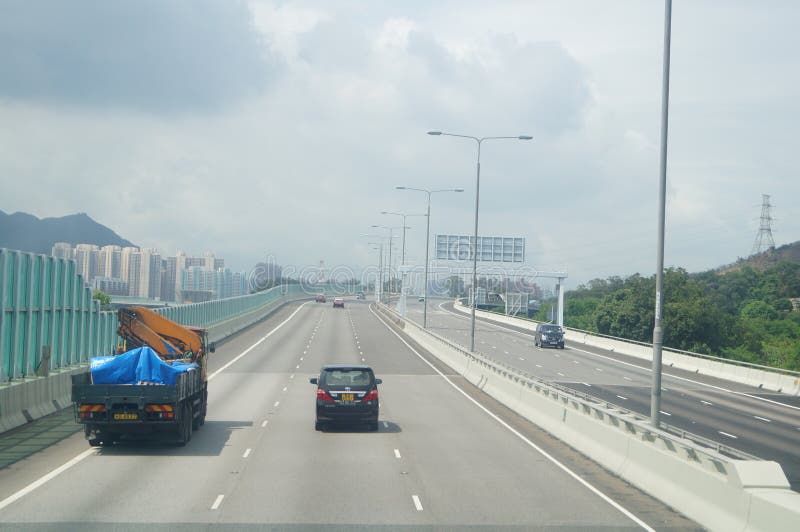 Hong-Kong, China: Tráfico por carretera fotos de archivo libres de regalías Hong-Kong, China: Tráfico por carretera fotos de archivo libres de regalías