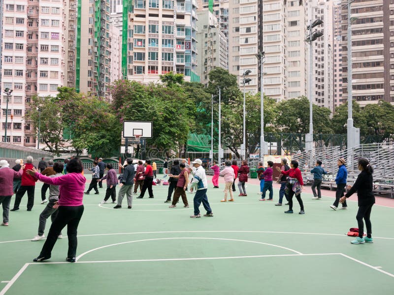 Hong Kong people doing exercise at public playground stock photo