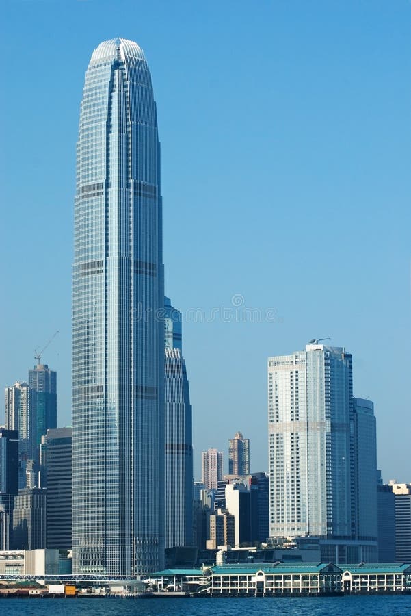 Hong Kong island with the International Finance Centre (2IFC) skyscraper. Central Pier in the foreground. Hong Kong island with the International Finance Centre (2IFC) skyscraper. Central Pier in the foreground.