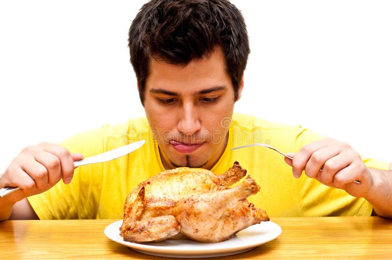Hongerig jonge mensenwachten om kip te eten