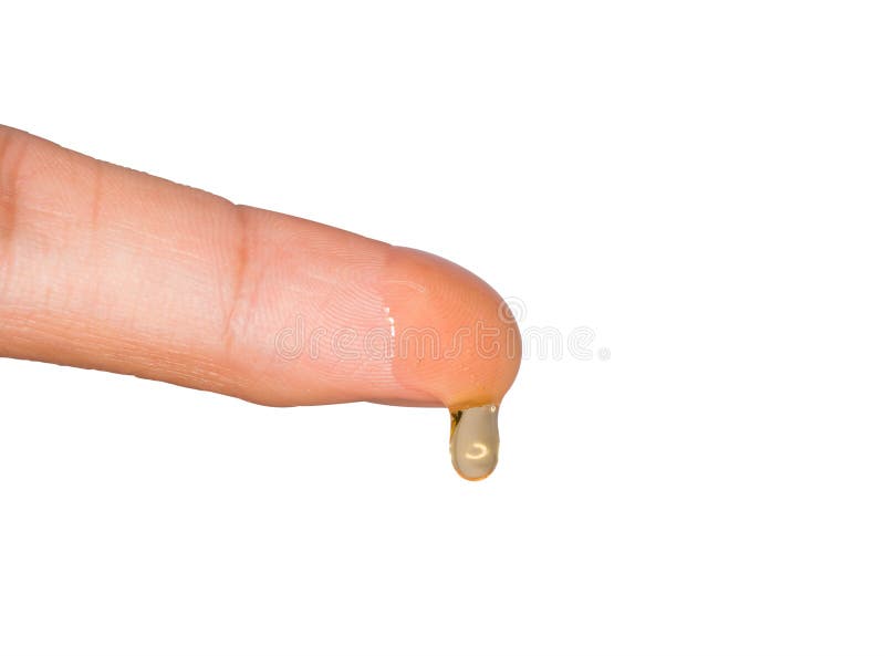 Honingsdruppel op vinger stock foto Honingsdruppel op vinger stock foto