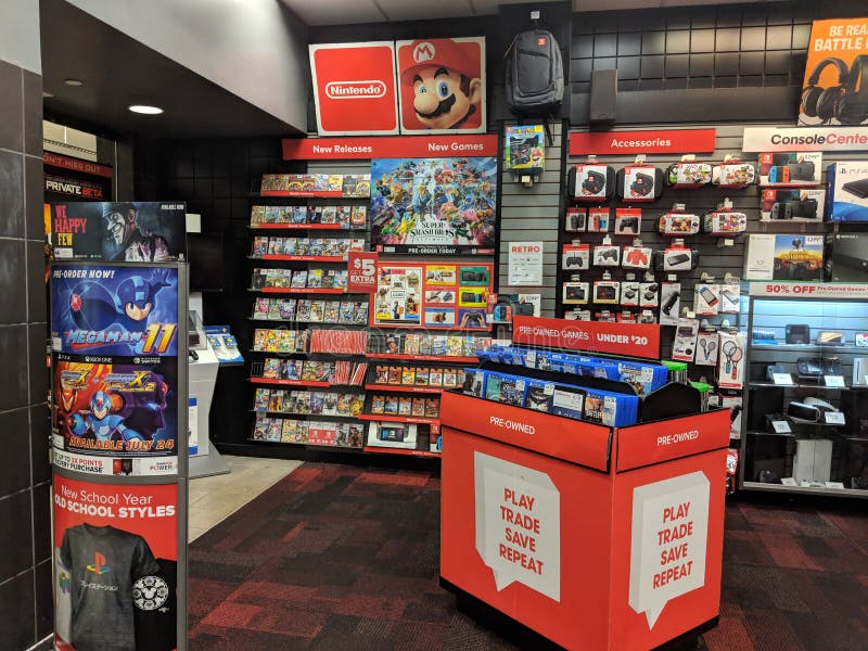 Nintendo Switch and other video game merchandise on display at Gamestop