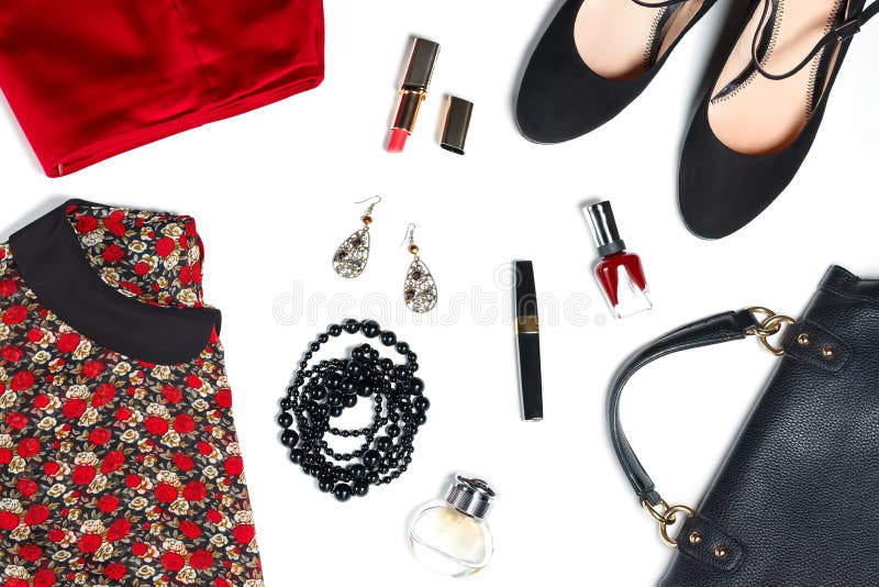 Female clothes and look essentials - silk blouse, red skirt, black high heels, black leather bag, red lipstick, perfume. Female clothes and look essentials - silk blouse, red skirt, black high heels, black leather bag, red lipstick, perfume
