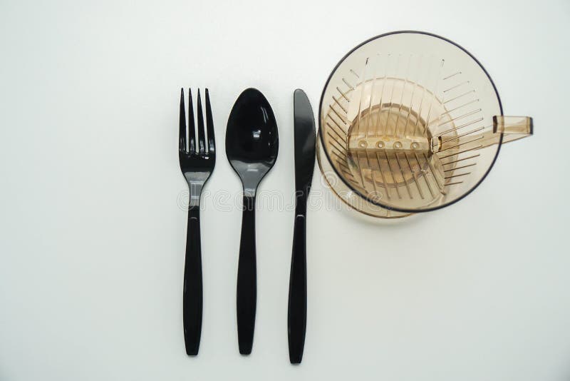 Hoogste mening van geïsoleerde plastic bestekwerktuigen met watermok royalty-vrije stock fotografie Hoogste mening van geïsoleerde plastic bestekwerktuigen met watermok royalty-vrije stock fotografie