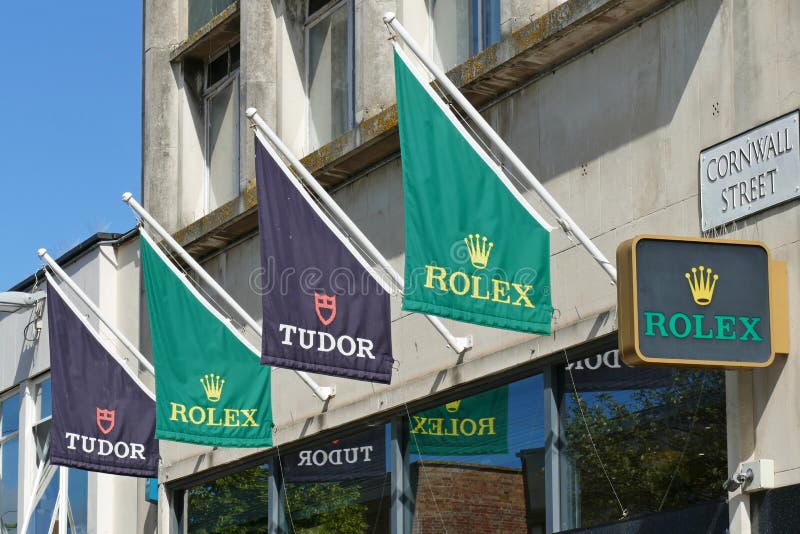 Hoogwaardige horlogemakers vlaggen van Rolex en Tudor stock foto's Hoogwaardige horlogemakers vlaggen van Rolex en Tudor stock foto's