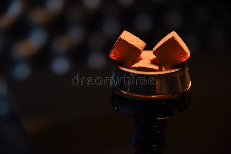 Hookah hot coals for smoking and leisure in natural lighting