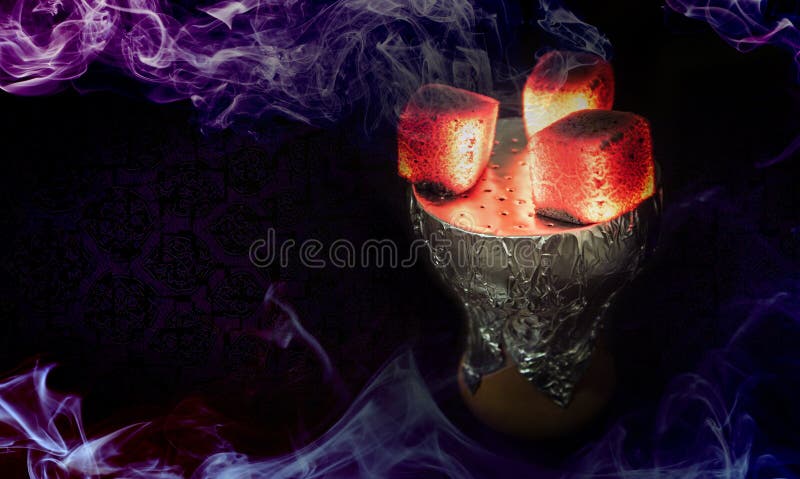 Hookah hot coals for smoking shisha and leisure in east pattern background. Hookah bowl with coal. Hookah wallpaper or best shisha art for web. Hookah craft strong tobacco.
