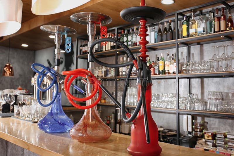 Hookahs on counter in bar stock image. Image of shisha 150082859