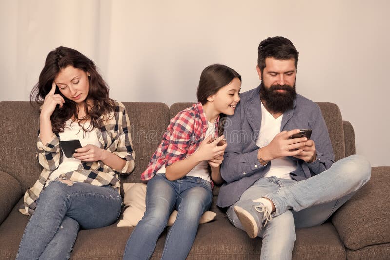 Hooked on Phone. Family Play Mobile Phone Game at Home. Staying Connected  with Cell Phone. Family Communication Stock Photo - Image of beard, baby:  180857330