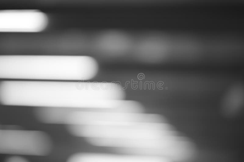 Horizontal Black and White Office Lamps Bokeh Background Stock Image