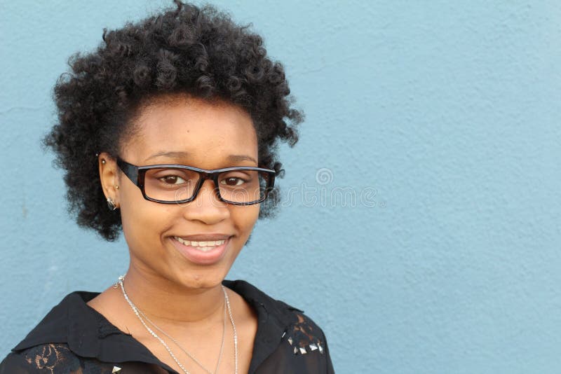 Horizontal outdoor portrait of beautiful African American young woman - Black people royalty free stock photo Horizontal outdoor portrait of beautiful African American young woman - Black people royalty free stock photo