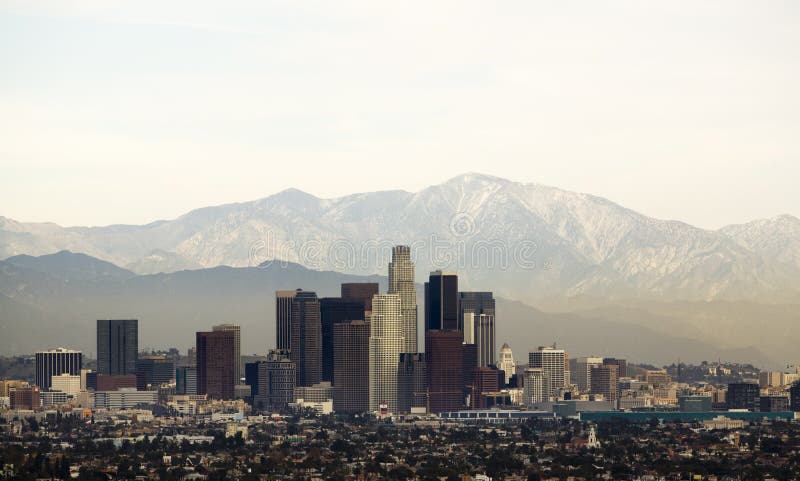 Horizontal image of downtown Los Angeles with mountains behind. Horizontal image of downtown Los Angeles with mountains behind