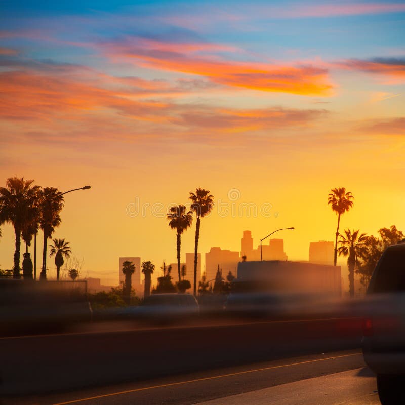 LA Los Angeles sunset skyline with traffic California from freeway. LA Los Angeles sunset skyline with traffic California from freeway