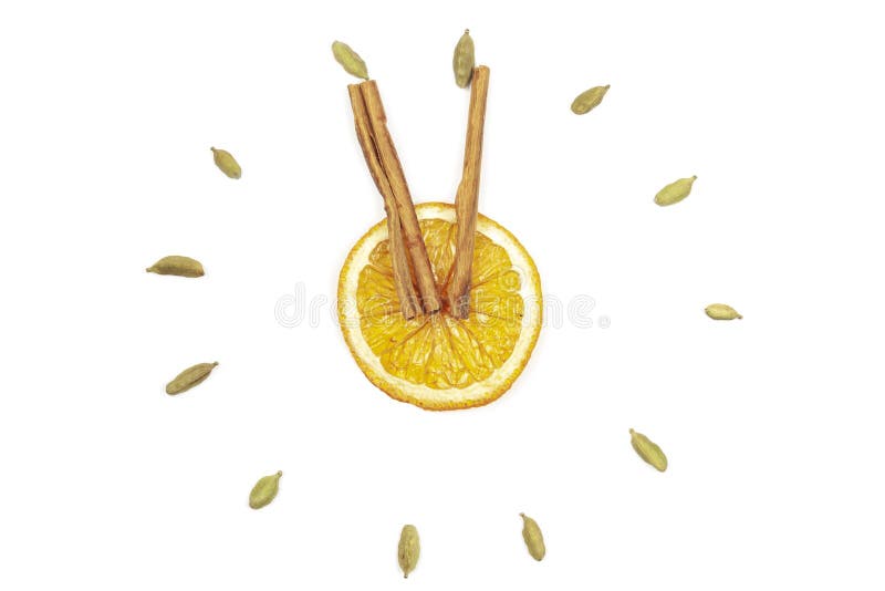 Horloge de citron et de cannelle sur un fond blanc, isolat images stock Horloge de citron et de cannelle sur un fond blanc, isolat images stock