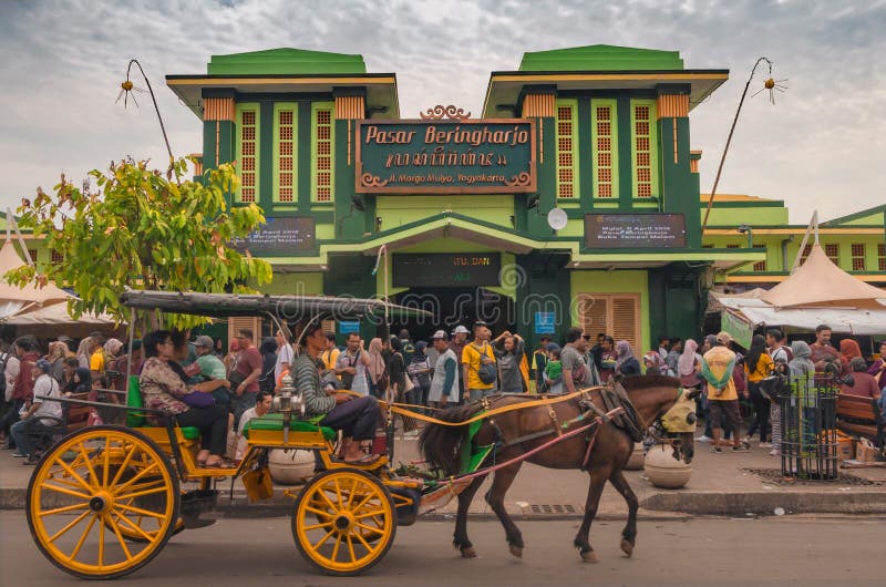 A Horse Carriage Through The Beringharjo Market In A Horse Carriage Through The Beringharjo Market In