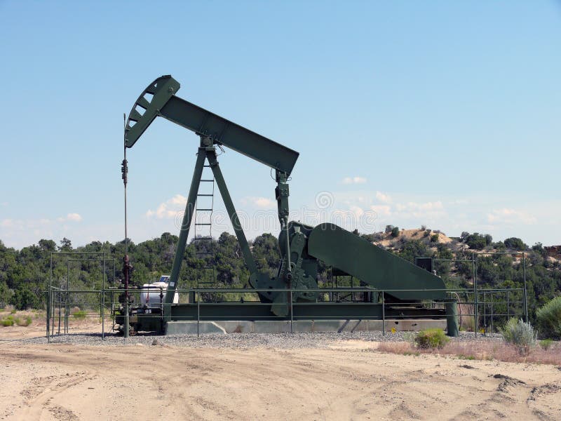 Horsehead oilpump stock photo. Image of tracksfossil 20490700