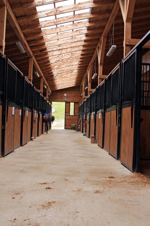 Entrance in a horse stable with many rooms for horses!