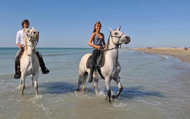 Horseback riding on the beach