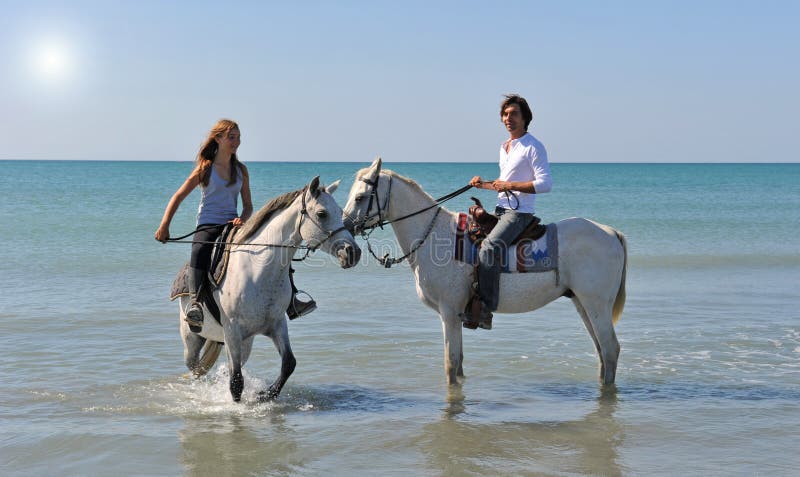 Horseback riding in the sea