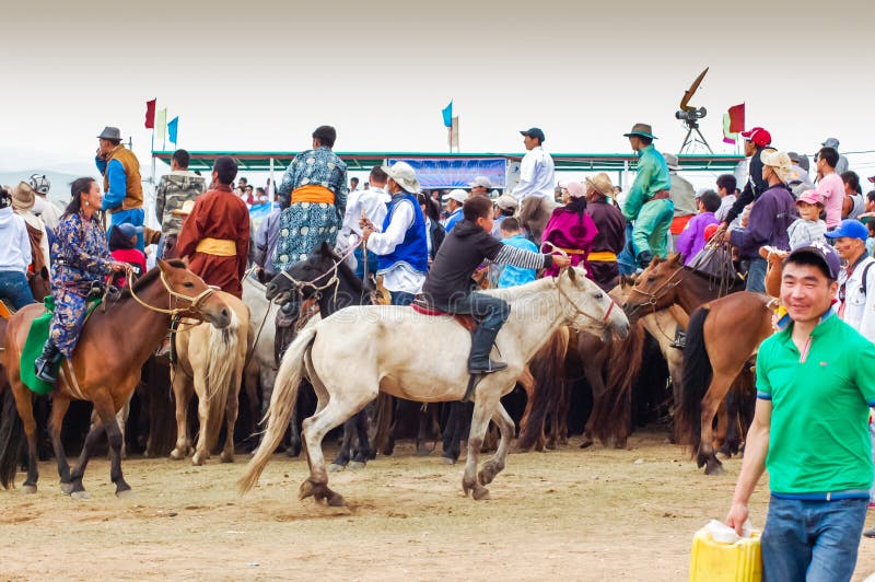 Horseback spectators watching Nadaam Horse Race royalty free stock image Horseback spectators watching Nadaam Horse Race royalty free stock image