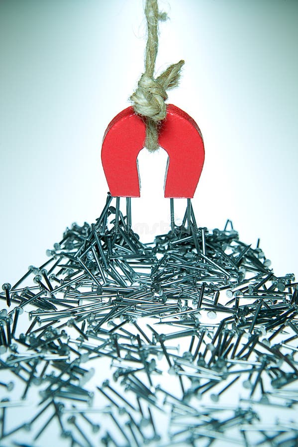 Horseshoe Magnet and Nails royalty free stock image Horseshoe Magnet and Nails royalty free stock image