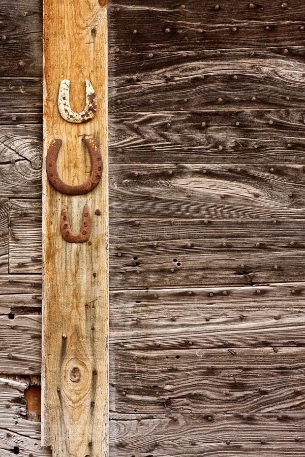 Old horseshoe on a wall stock photo. Image of aged, brown 155389780