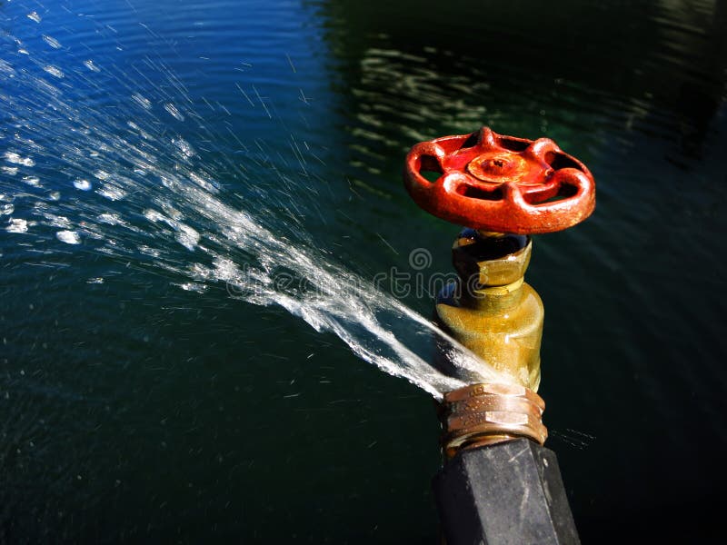 Hose Faucet Connection Leaking and Squirting Water royalty free stock images Hose Faucet Connection Leaking and Squirting Water royalty free stock images