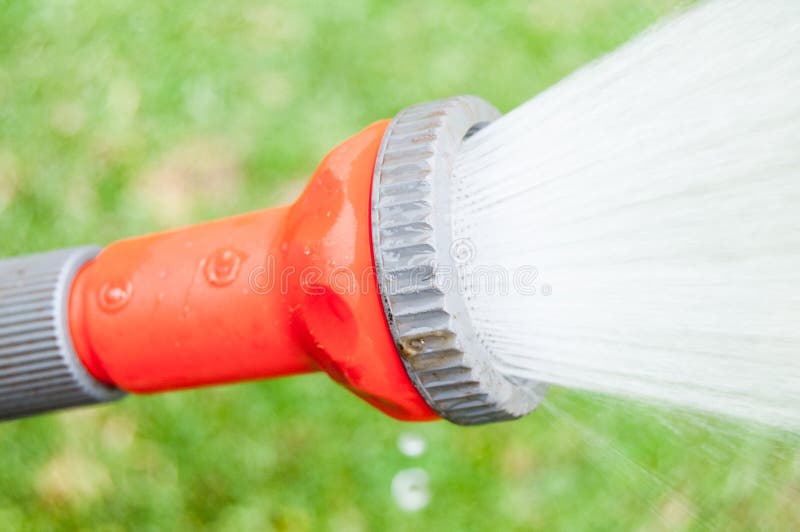 Hose Pipe Water Orange stock photo. Image of water, spray 84411014