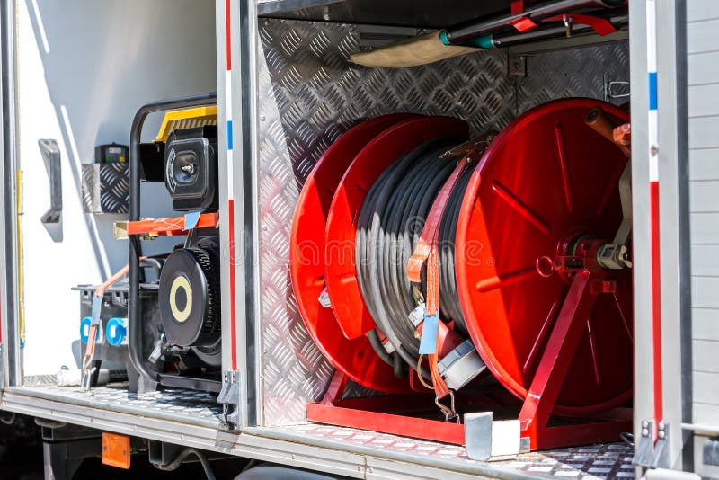 Hoses and Other Fire Fighting Equipment on Board a Fire Truck Stock