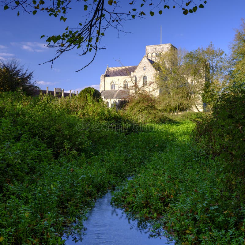 Hospital da cruz do St e Almhouses da pobreza nobre, na luz solar de nivelamento morna do outono, Winchester, Hampshire, Reino Un imagens de stock Hospital da cruz do St e Almhouses da pobreza nobre, na luz solar de nivelamento morna do outono, Winchester, Hampshire, Reino Un imagens de stock