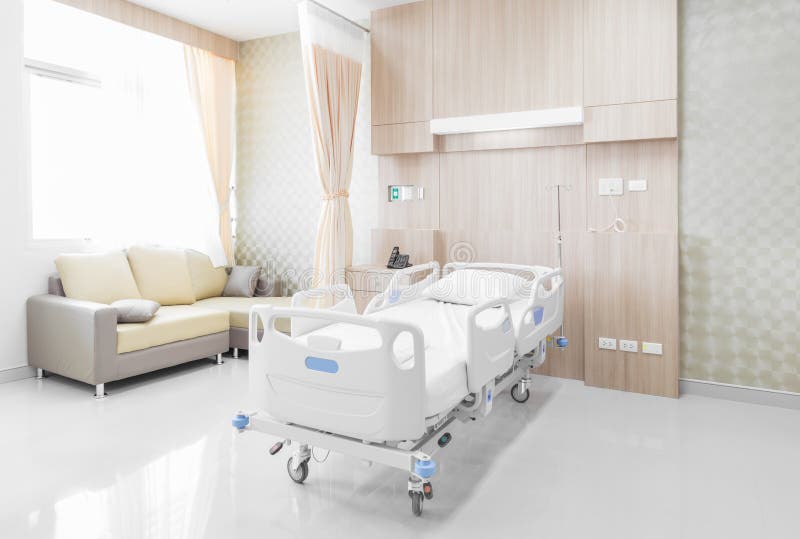 Hospital Room with Beds and Comfortable Medical Equipped in a Mo Stock