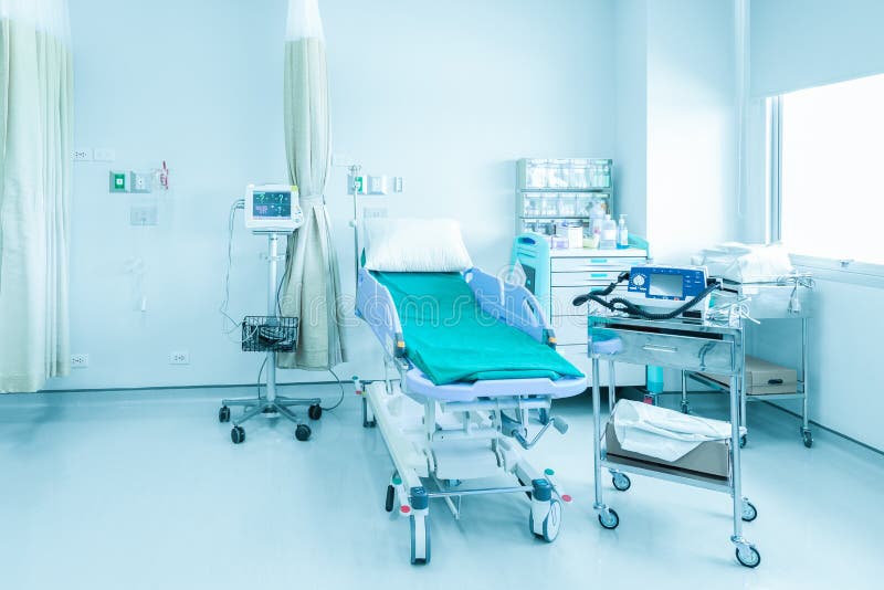 Hospital room with beds and comfortable medical equipped in a mo stock images