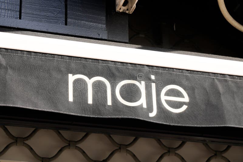 Maje Logo Brand Boutique and Text Sign Clothes Facade Store French ...
