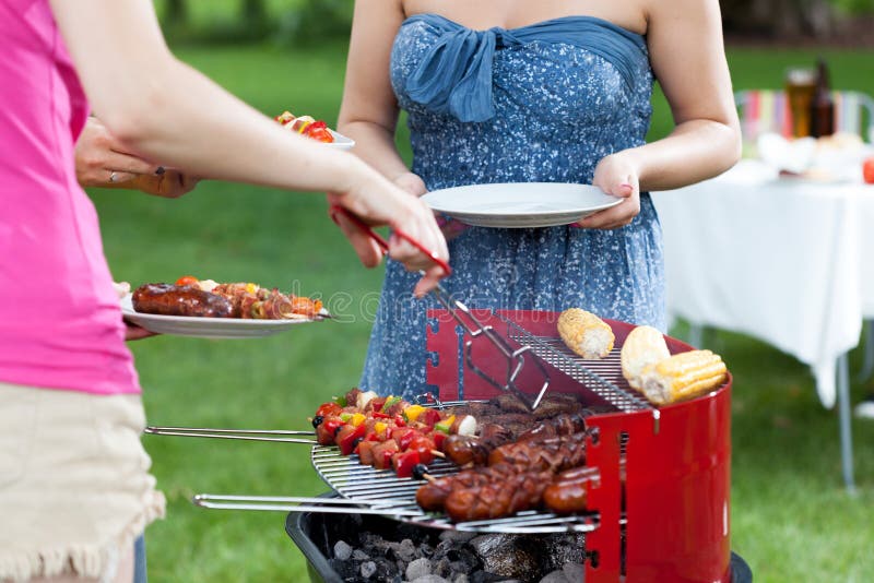 Host Serving Meals on Barbecue Party Stock Photo Image of barbeque, grill 54907022