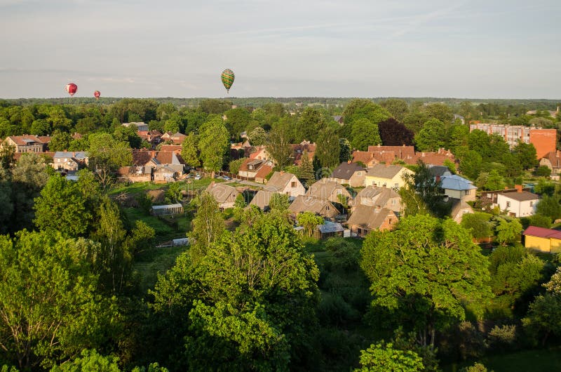 Hot air balloon flight over the city of Kuldiga, Latvia stock photography