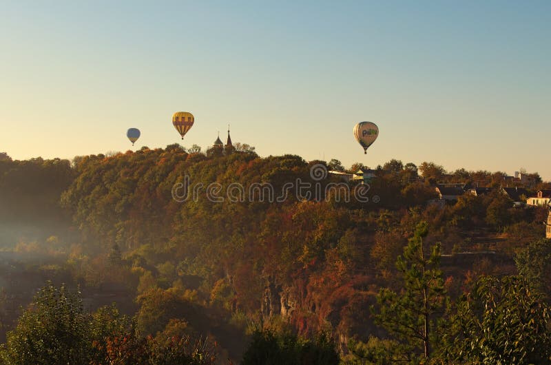 Hot Air Balloons Festival `Gold Omega 2018â€. Three hot air balloons are flying near Kamianets-Podilskyi castle royalty free stock photography Hot Air Balloons Festival `Gold Omega 2018â€. Three hot air balloons are flying near Kamianets-Podilskyi castle royalty free stock photography