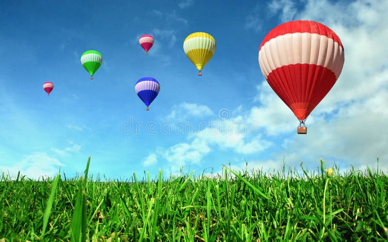 Hot Air Balloons Floating Over Green Field Stock Image Image of