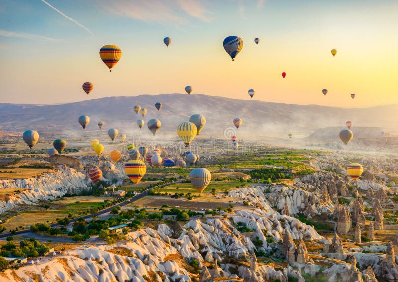 Hot Air Balloons at Sunrise Stock Photo - Image of famous, hill: 229596176 Hot Air Balloons at Sunrise Stock Photo - Image of famous, hill: 229596176
