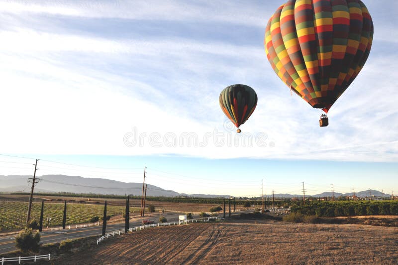 Hot Air Balloons Soaring over roadways