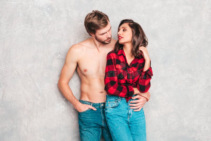 Handsome Man and Beautiful Woman Posing in Studio Stock Image pic