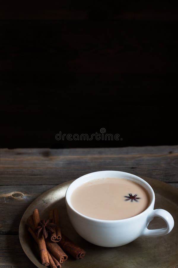 Hot beverage in cup and spices. Style rustic. Copy space. Selective focus. Traditional big metal pot stock images, royalty-free photos and pictures
