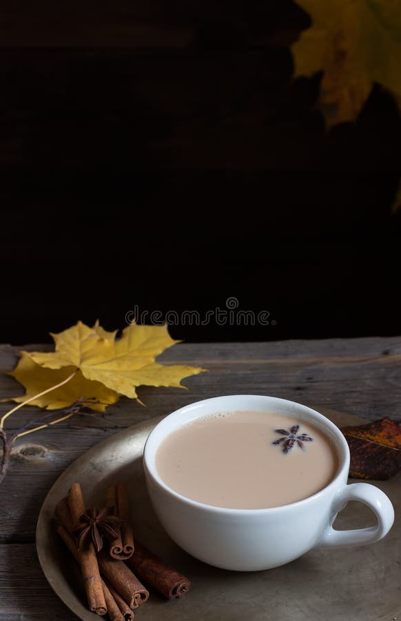 Hot beverage in cup and spices. Style rustic. Copy space. Selective focus. Traditional big metal pot stock images, royalty-free photos and pictures